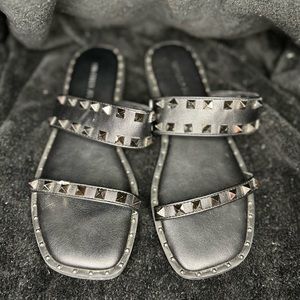 Studded black slide sandals